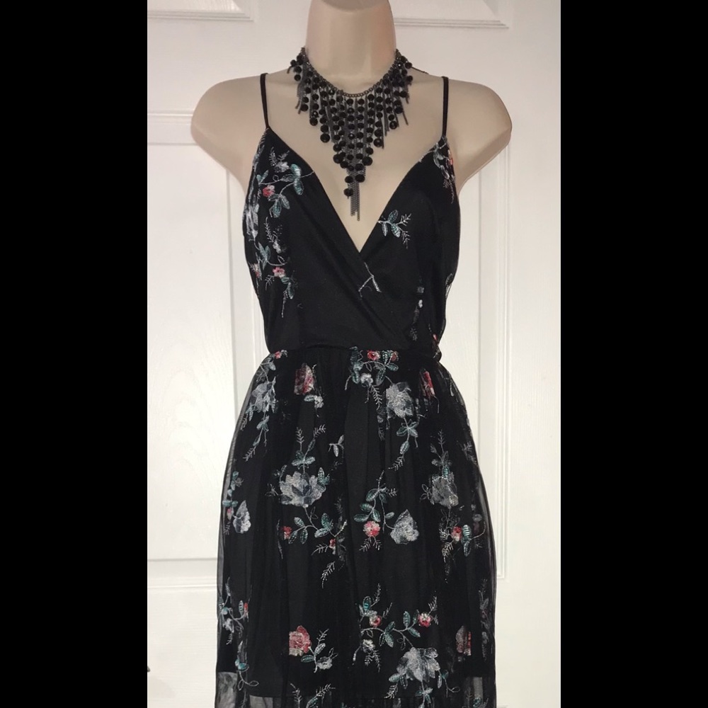 Black spaghetti dress with sheer skirt